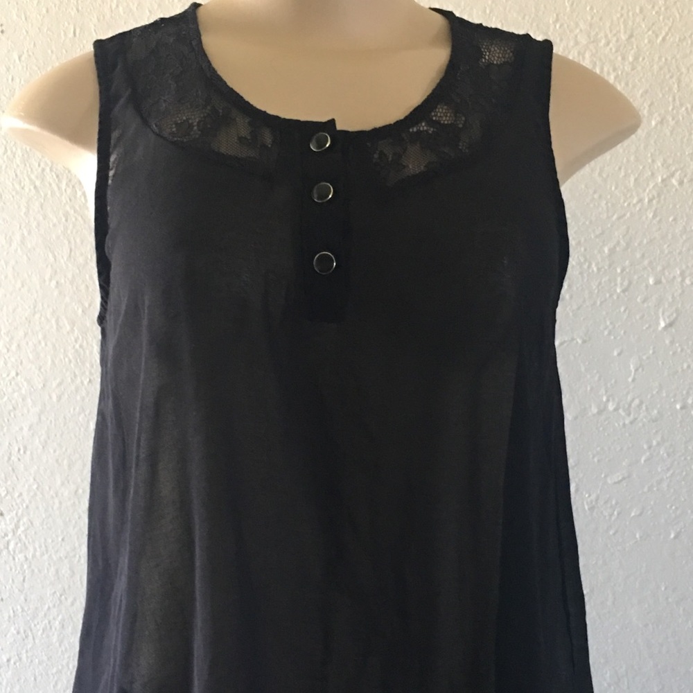 Black blouse with lace details.